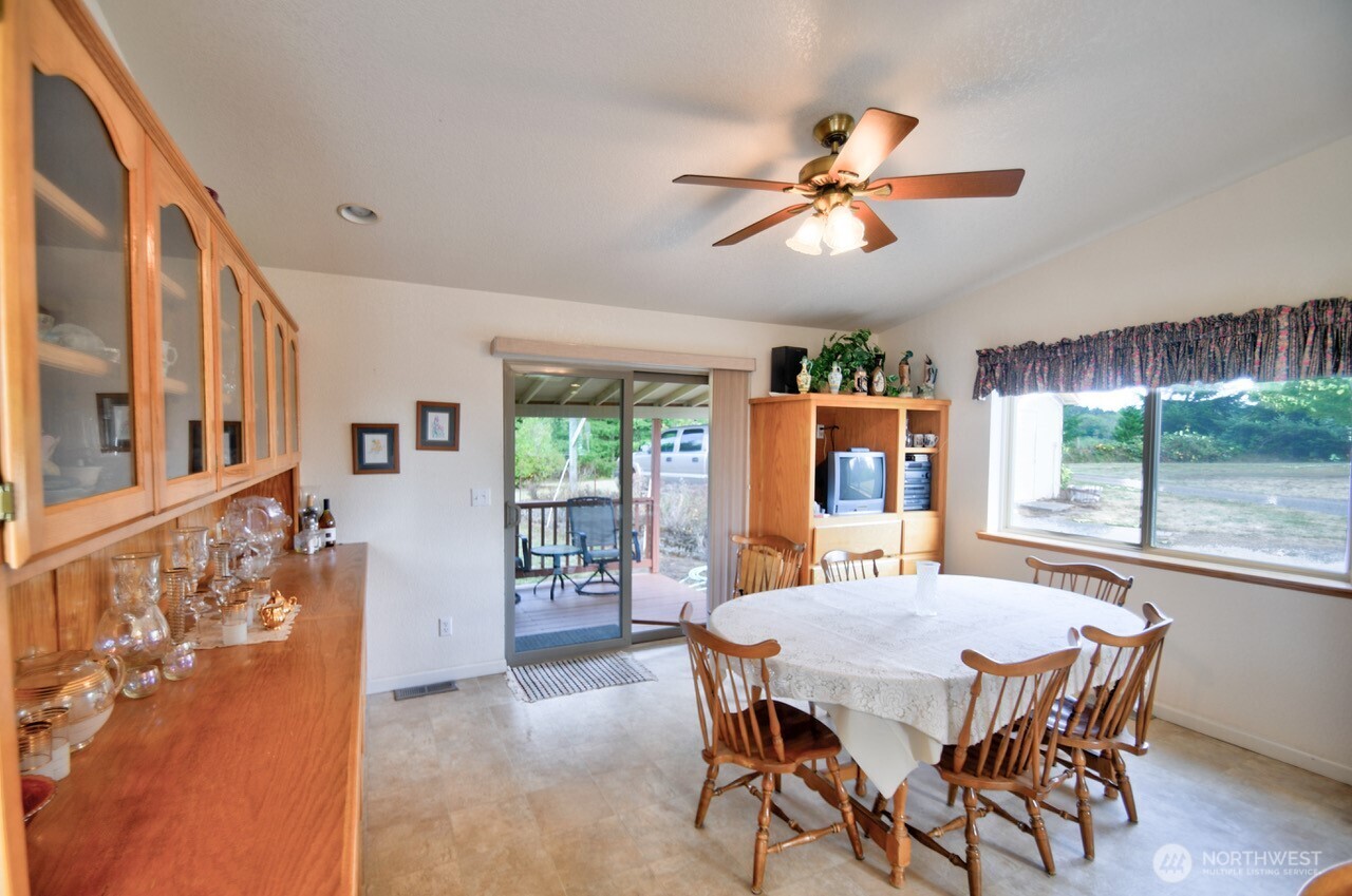 378 Burnt Ridge Road Onalaska, WA 98570 - Photo 11 of 40 a dining room with furniture and window