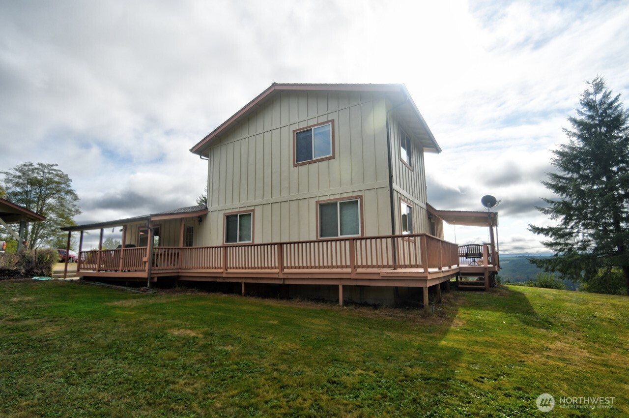 378 Burnt Ridge Road Onalaska, WA 98570 - Photo 27 of 40 a view of a house with a wooden deck