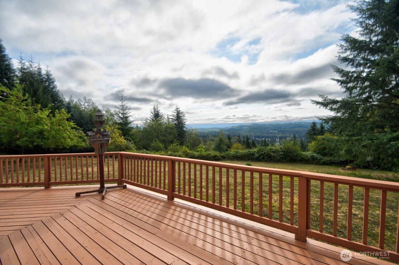 378 Burnt Ridge Road Onalaska, WA 98570 - Photo 30 of 40 a view of balcony with wooden floor and fence