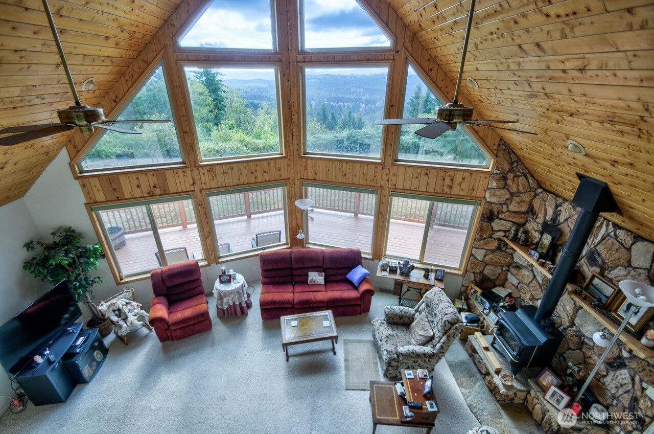 378 Burnt Ridge Road Onalaska, WA 98570 - Photo 6 of 40 a living room with furniture and a window