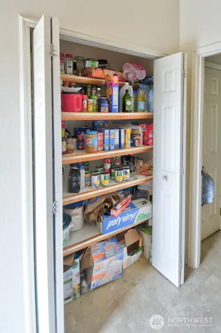 a room with storage and utility