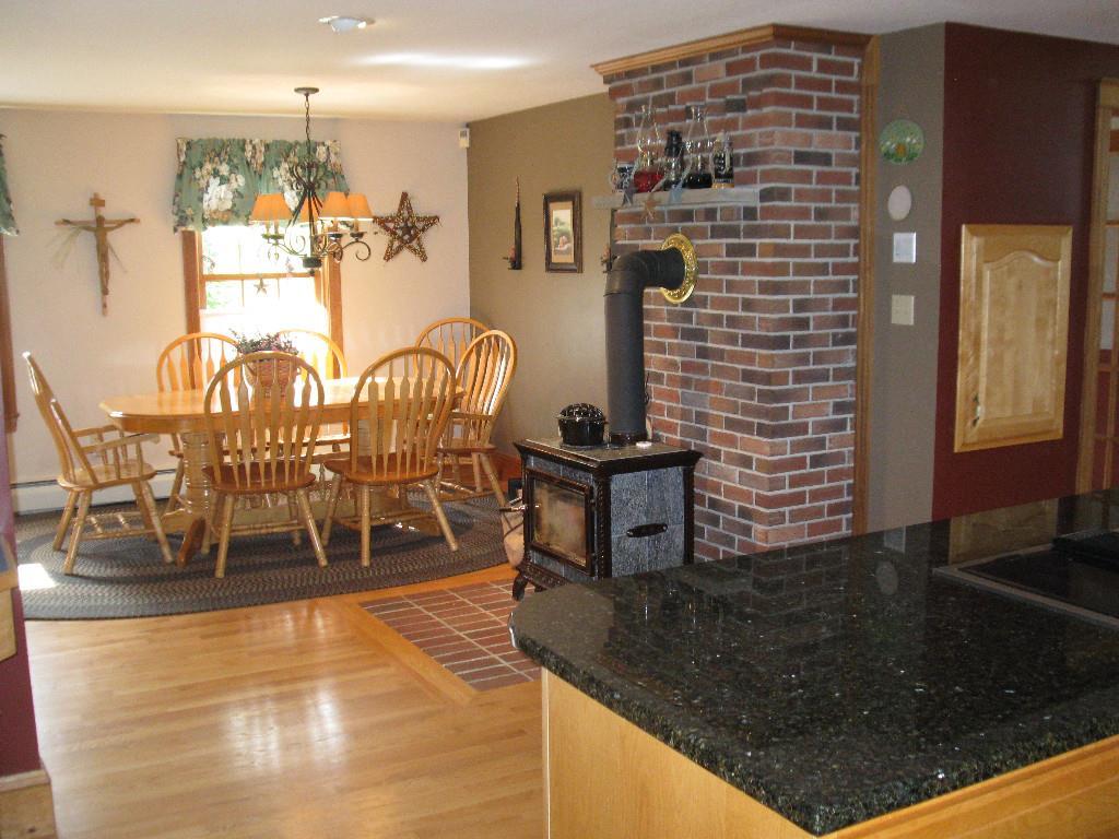 19 Windy Ridge Lane Sanford, ME 04083 - Photo 5 of 16 Dining room w/ hardwood flooring and...