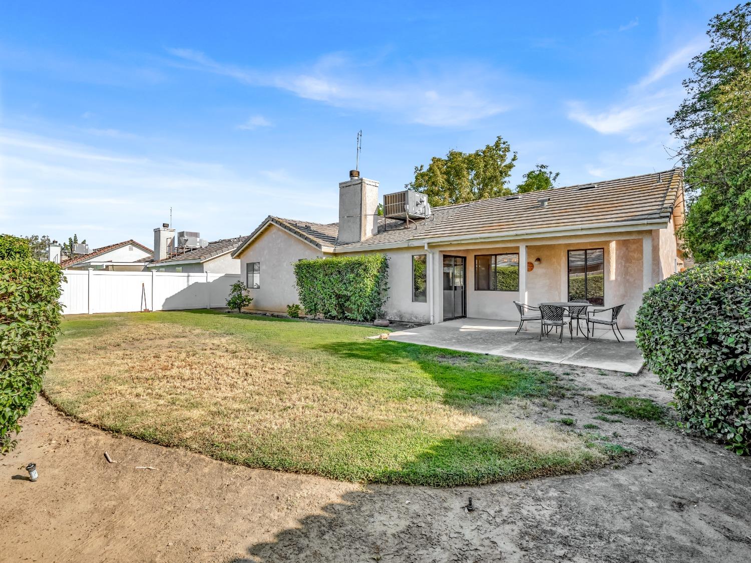 2048 Maple Street Selma, CA 93662 - Photo 17 of 20 a house view with a garden space