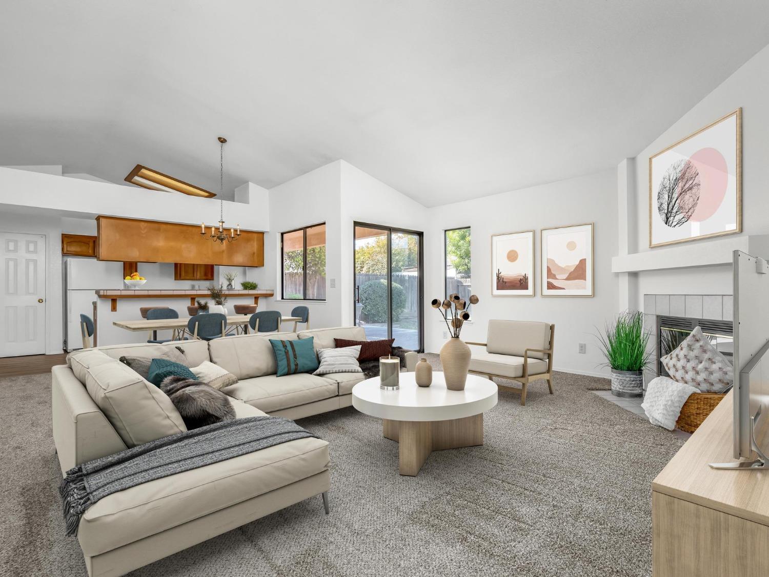2048 Maple Street Selma, CA 93662 - Photo 2 of 20 a living room with furniture and a large window