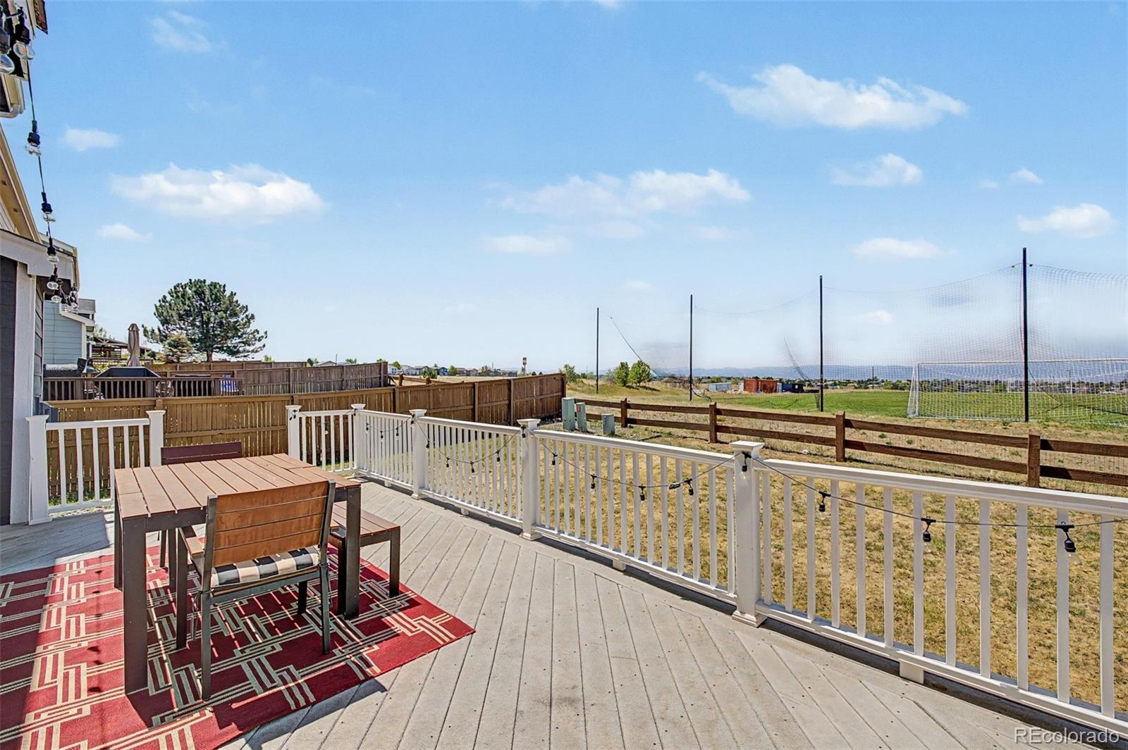 9917 Aftonwood Street Highlands Ranch, CO 80126 - Photo 41 of 48 a view of a balcony with chairs