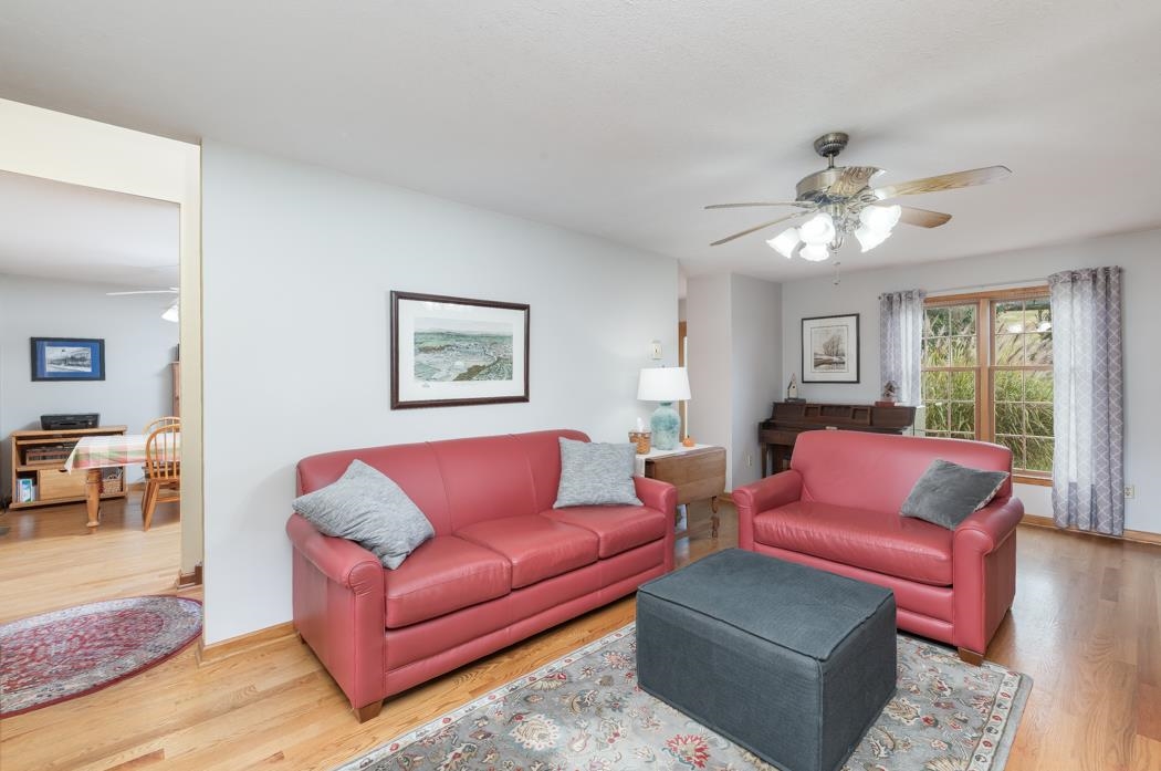 1284 Limestone Road Mount Sidney, VA 24467 - Photo 14 of 65 a living room with furniture a couch and a chandelier