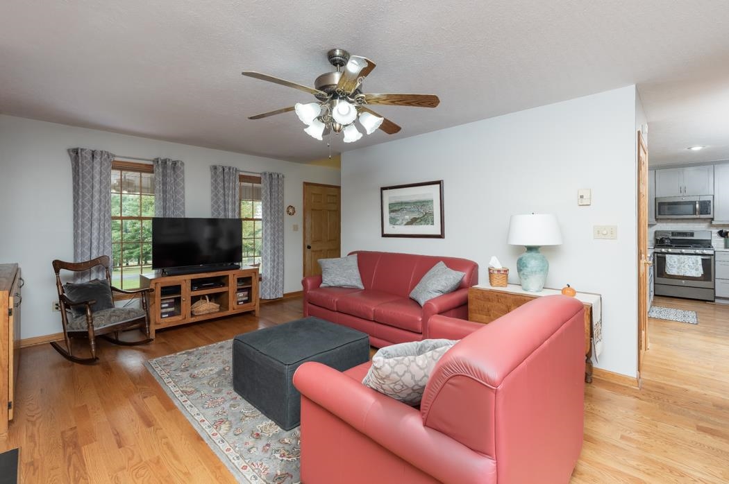 1284 Limestone Road Mount Sidney, VA 24467 - Photo 15 of 65 a living room with furniture and a flat screen tv