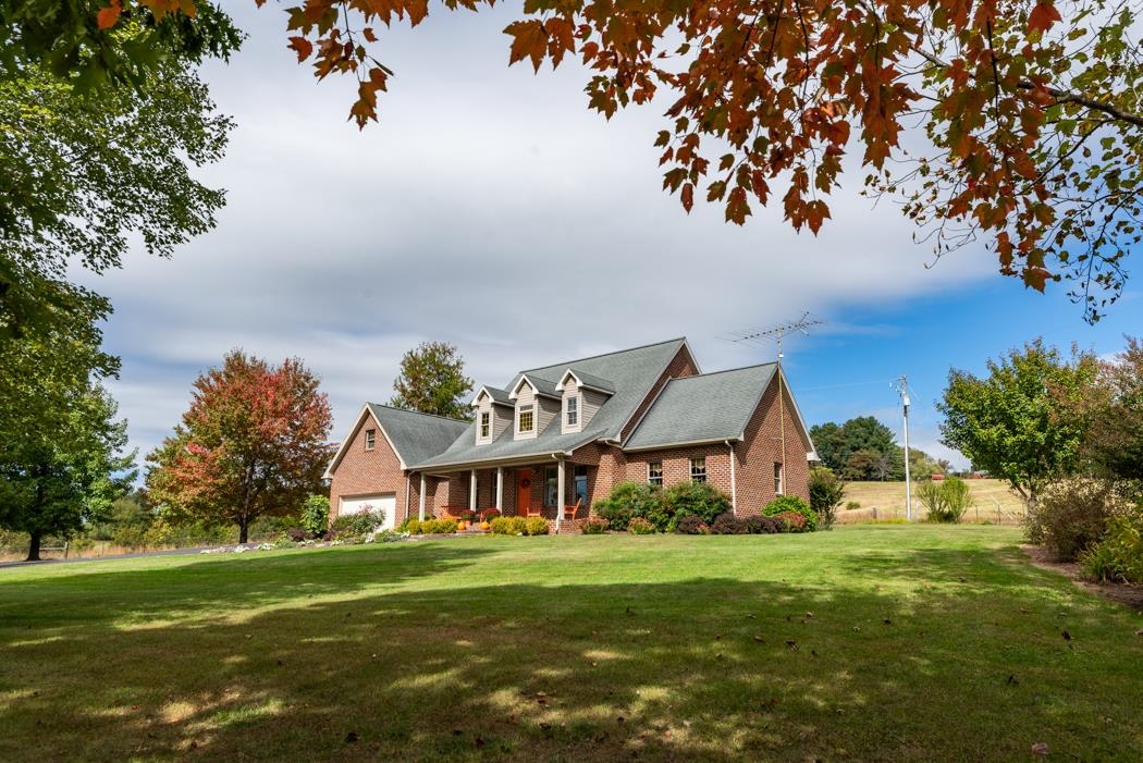 1284 Limestone Road Mount Sidney, VA 24467 - Photo 3 of 65 a front view of a house with a big yard