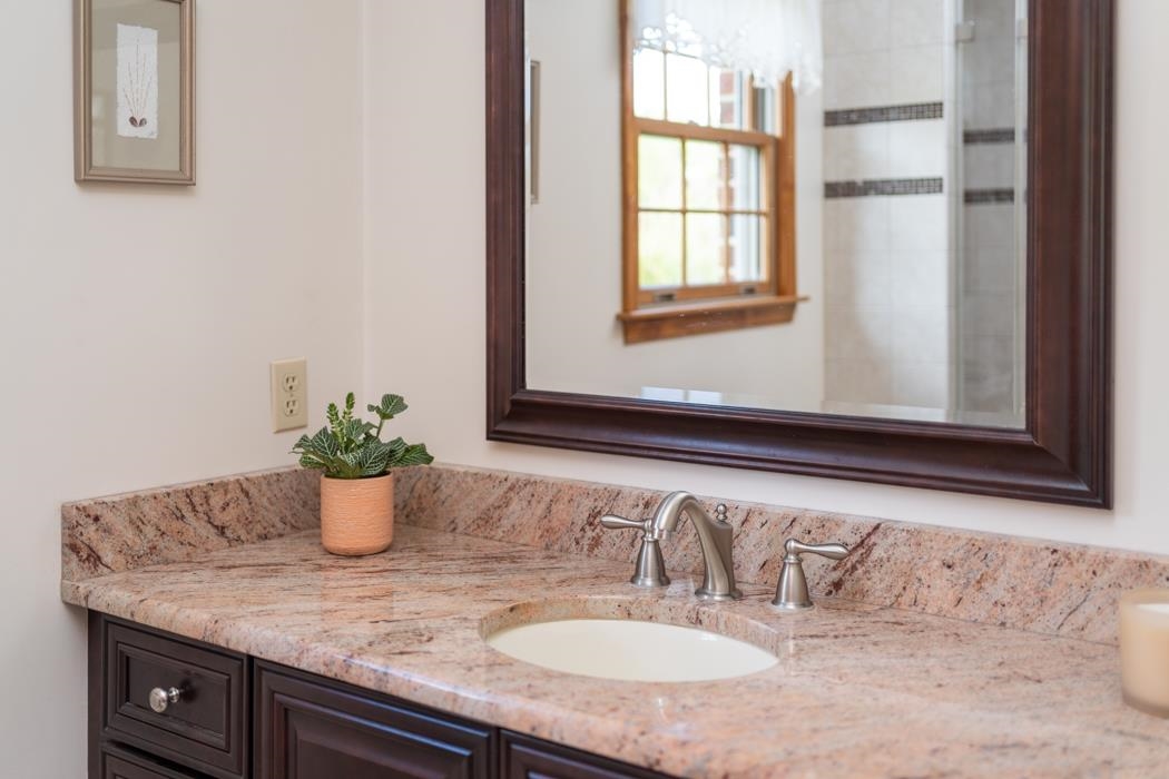 1284 Limestone Road Mount Sidney, VA 24467 - Photo 35 of 65 a bathroom with a granite countertop sink and a mirror