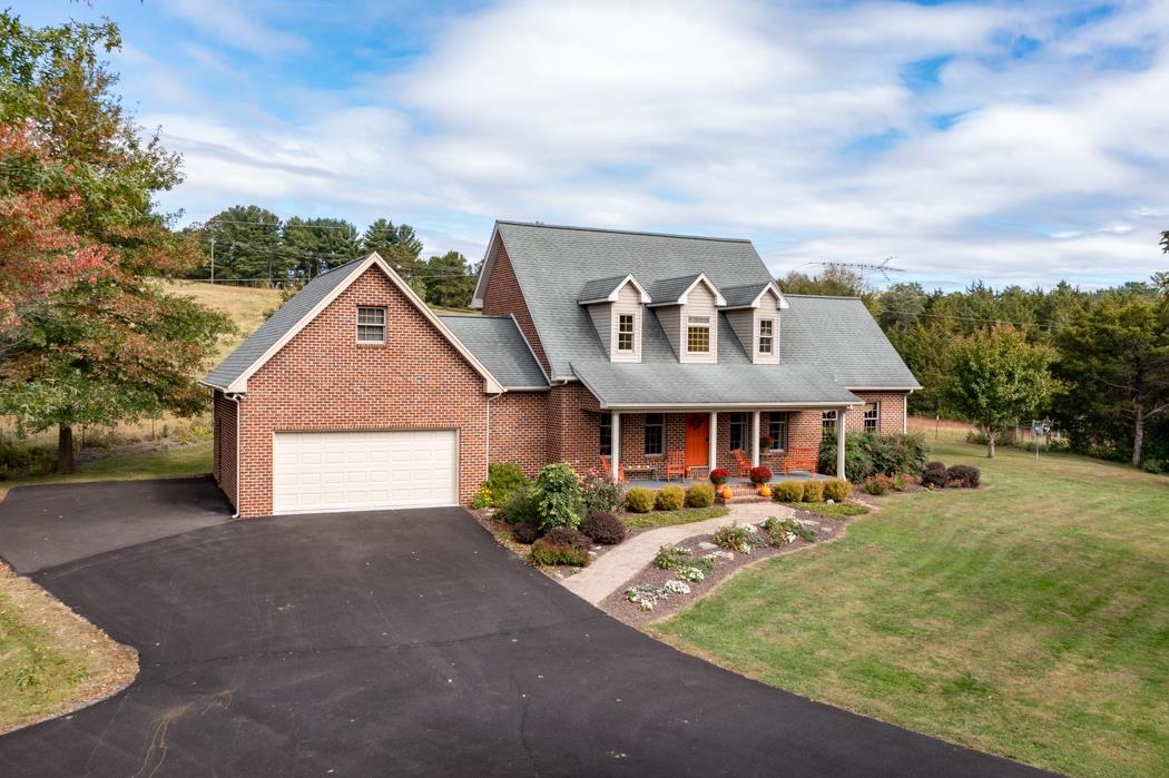 1284 Limestone Road Mount Sidney, VA 24467 - Photo 49 of 65 a front view of a house with a yard