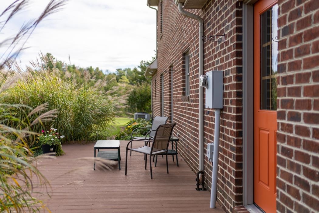 1284 Limestone Road Mount Sidney, VA 24467 - Photo 50 of 65 a backyard of a house with outdoor seating