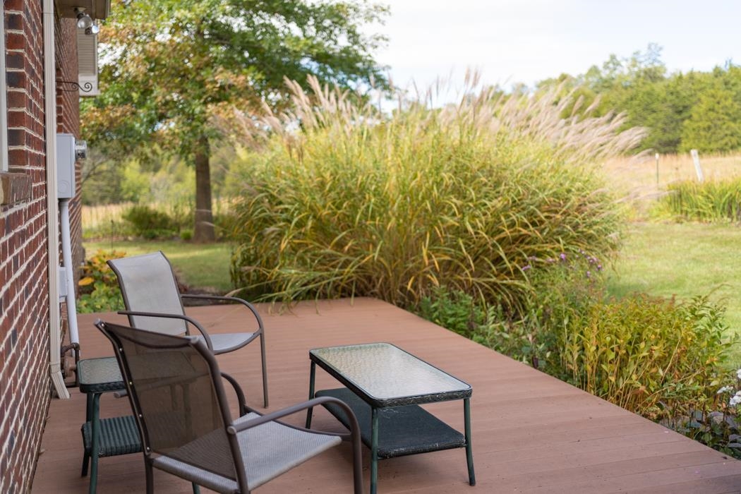 1284 Limestone Road Mount Sidney, VA 24467 - Photo 52 of 65 a backyard of a house with table and chairs