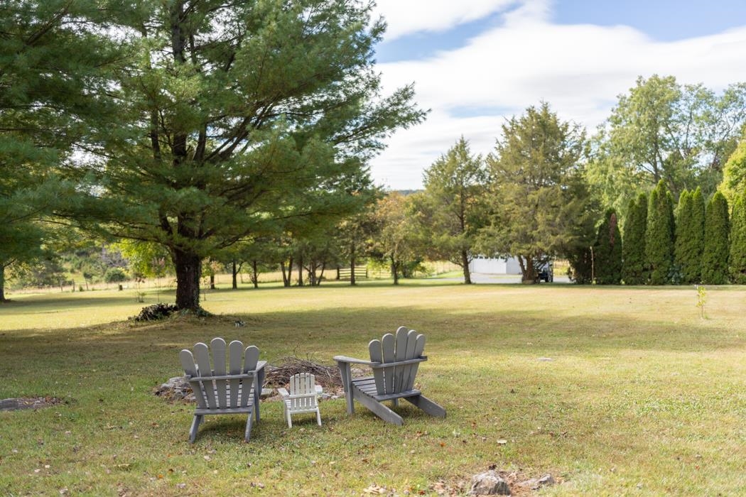 1284 Limestone Road Mount Sidney, VA 24467 - Photo 59 of 65 a swimming pool with outdoor seating and yard