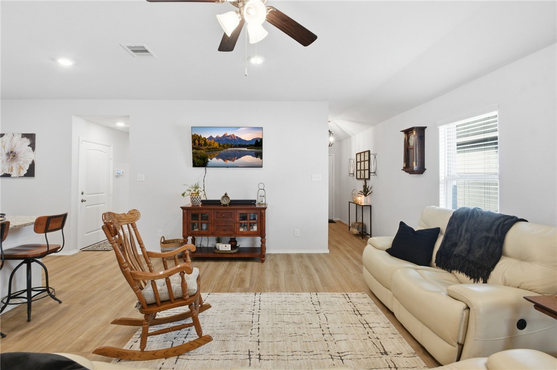 2425 Mulligan Lane Navasota, TX 77868 - Photo 11 of 48 a living room with furniture and a flat screen tv
