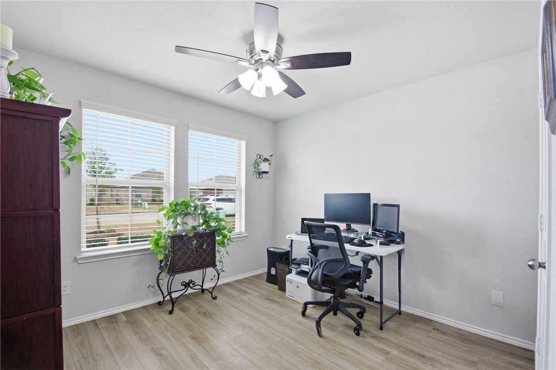 2425 Mulligan Lane Navasota, TX 77868 - Photo 28 of 48 a view of a workspace with furniture and a window