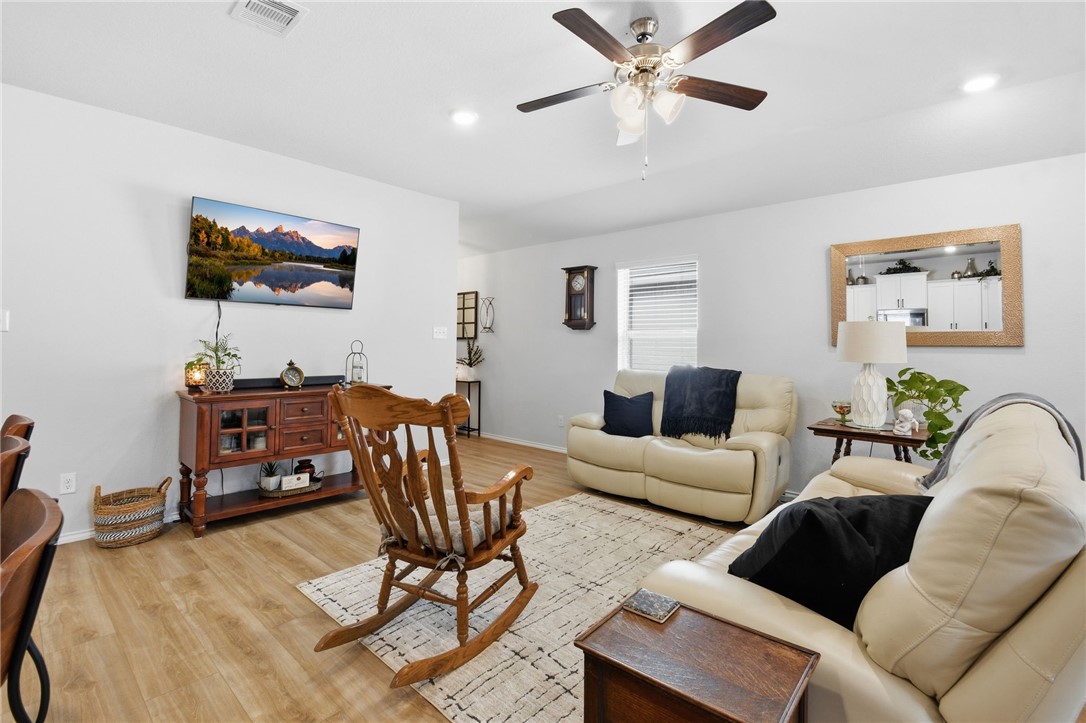 2425 Mulligan Lane Navasota, TX 77868 - Photo 10 of 48 a living room with furniture and a flat screen tv