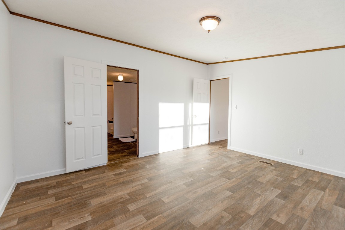 145 Crooked Road Dale, TX 78616 - Photo 18 of 26 a view of an empty room with a window