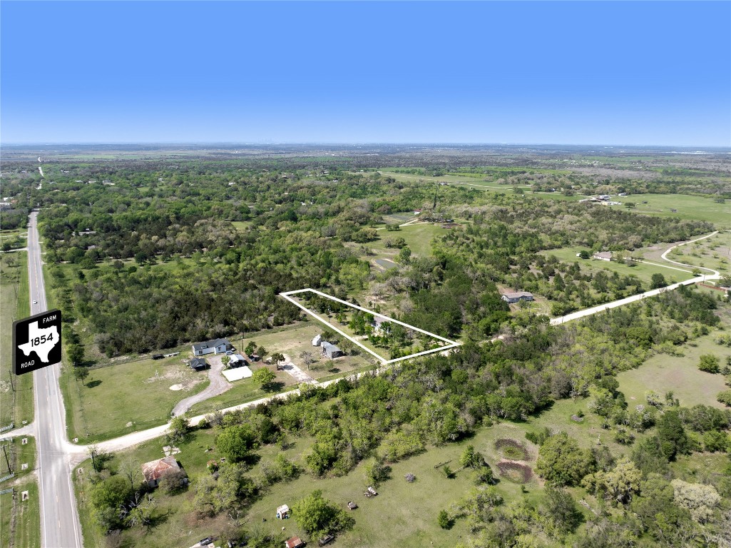 145 Crooked Road Dale, TX 78616 - Photo 2 of 26 an aerial view of residential houses with outdoor space
