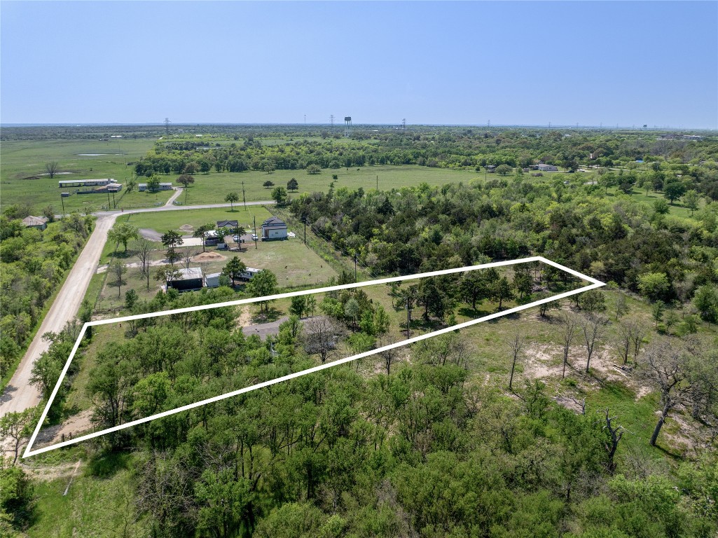 145 Crooked Road Dale, TX 78616 - Photo 25 of 26 a view of a green field with mountains in the background
