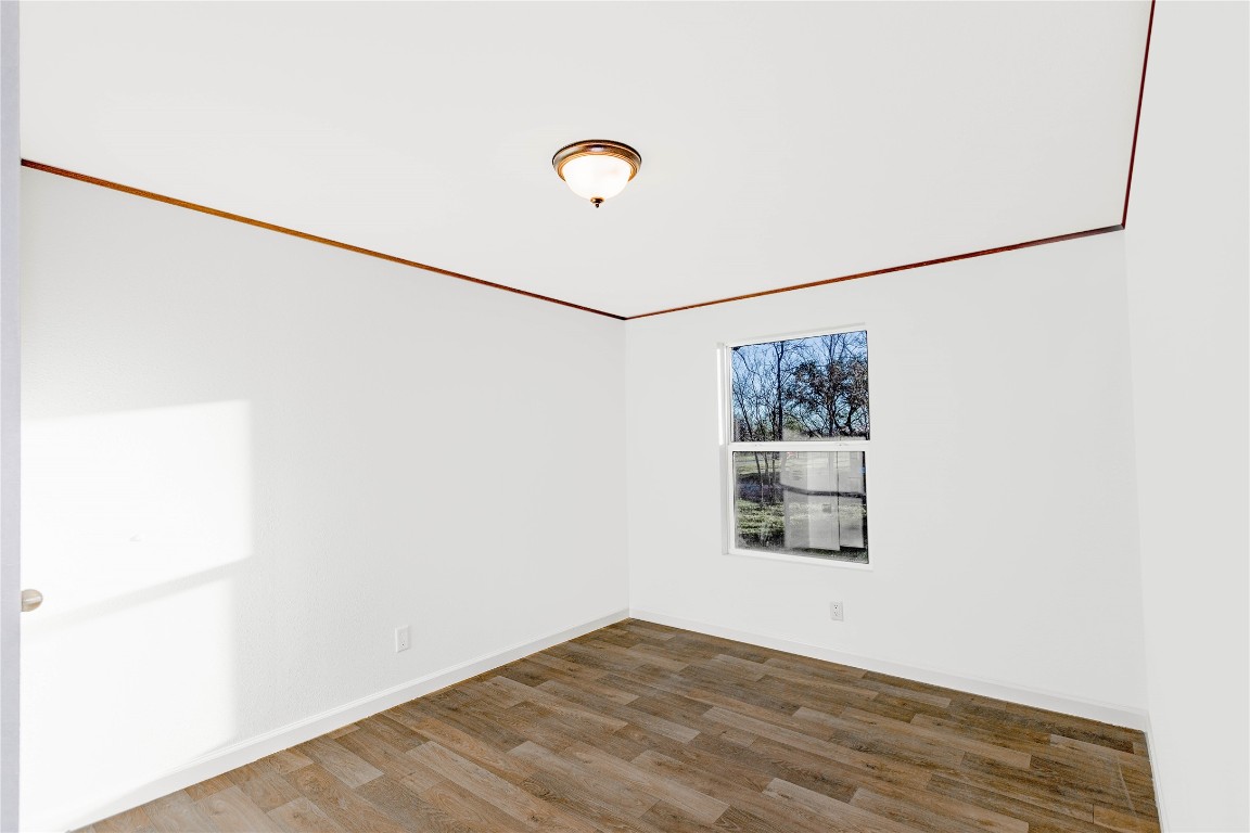 145 Crooked Road Dale, TX 78616 - Photo 10 of 26 a view of an empty room and window
