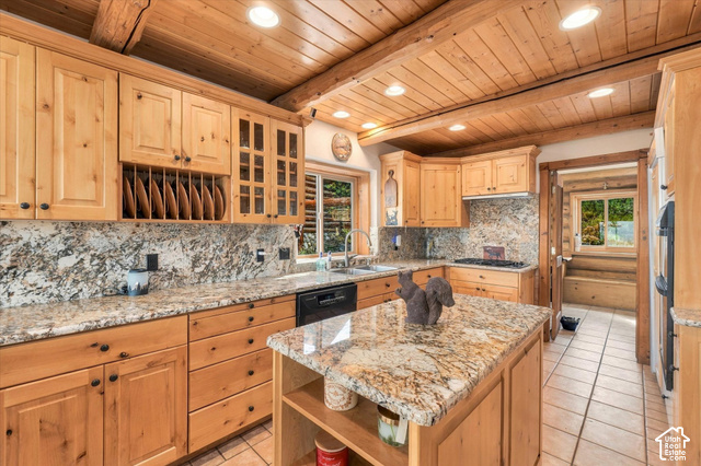1701 Oak Road Coalville, UT 84017 - Photo 18 of 71 Wood-paneled ceiling with exposed beams, light wood cabinetry, granite countertops, tile flooring, and integrated appliances