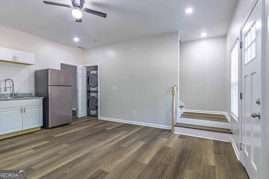 5971 Bloomfield Road Macon, GA 31206 - Photo 7 of 19 a view of a kitchen with refrigerator and wooden floor