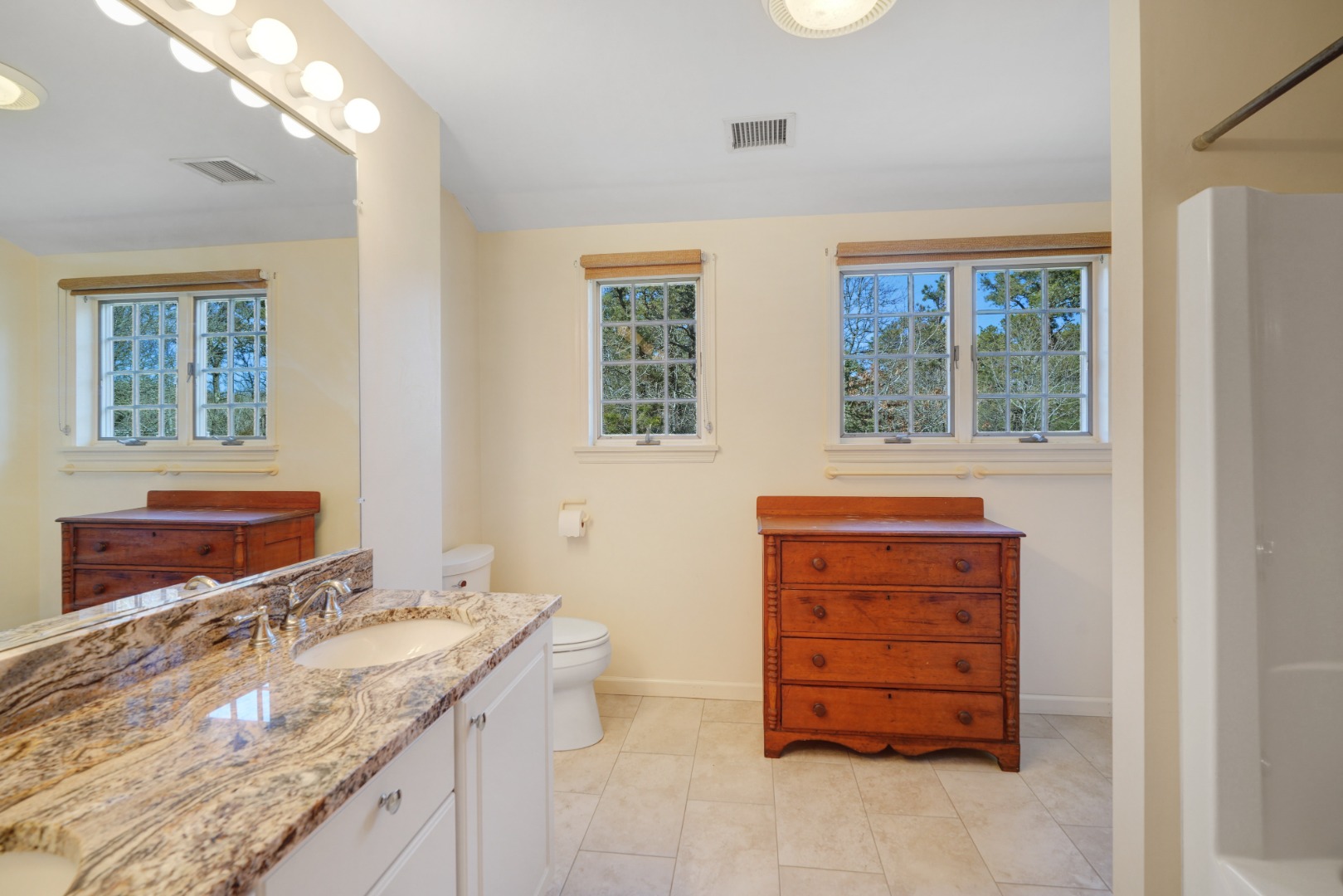 2 Cosmos Way Edgartown, MA 02539 - Photo 23 of 29 a bathroom with a granite countertop sink and a mirror