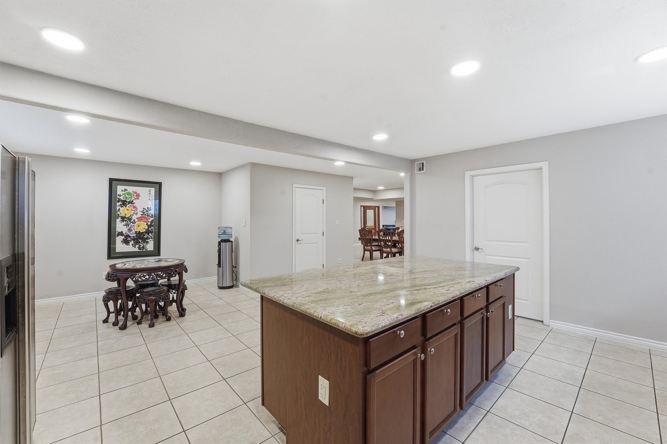 3227 Audley Street Houston, TX 77098 - Photo 15 of 30 a room with a sink a table and chairs