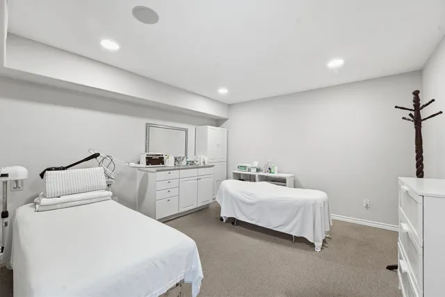 a room with a bed and a chair