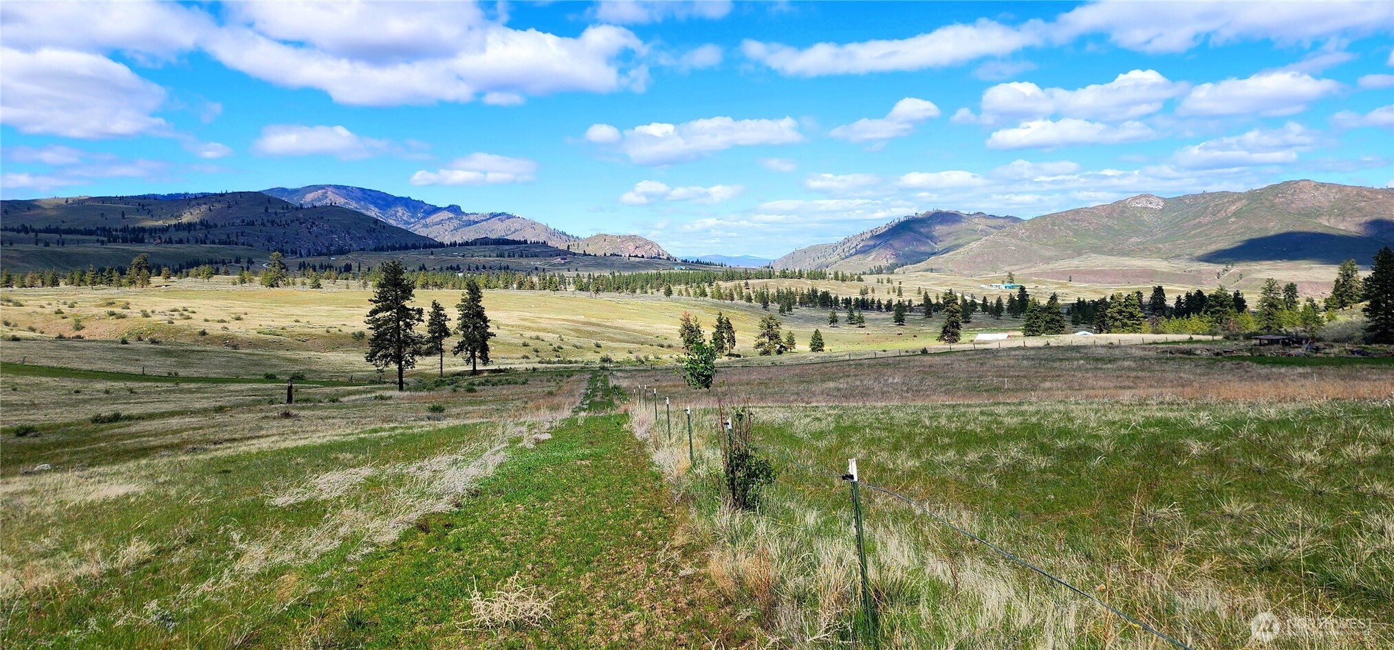 1 Washington Creek Road Chelan, WA 98816 - Photo 3 of 27 a view of an ocean with a mountain