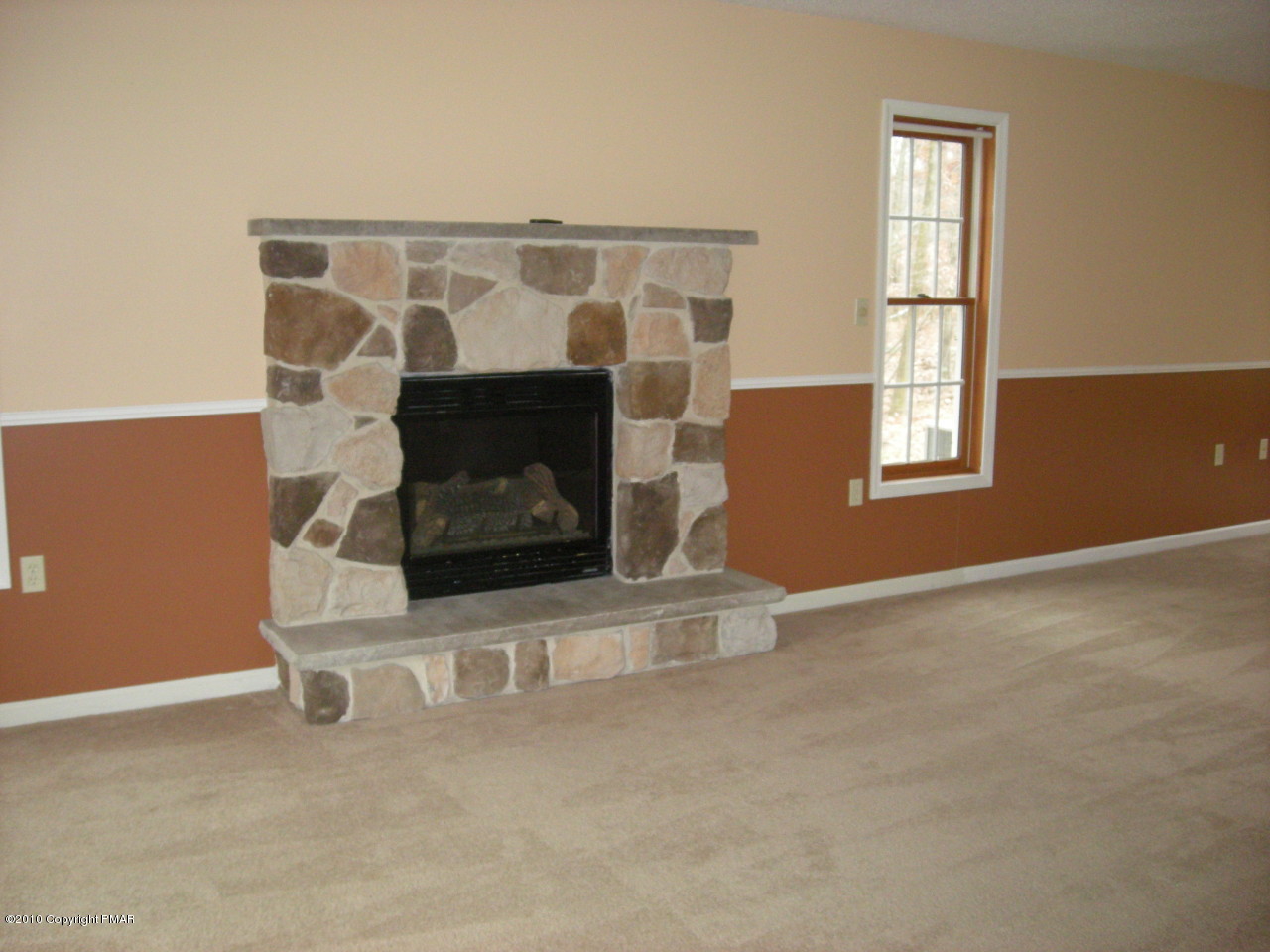719 Dancing Ridge Road East Stroudsburg, PA 18302 - Photo 3 of 12 an empty room with windows