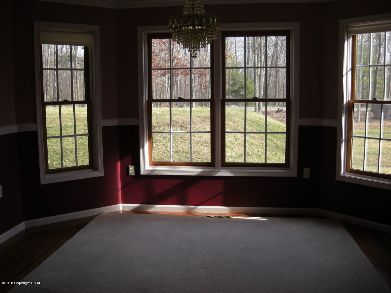 719 Dancing Ridge Road East Stroudsburg, PA 18302 - Photo 6 of 12 an empty room with windows