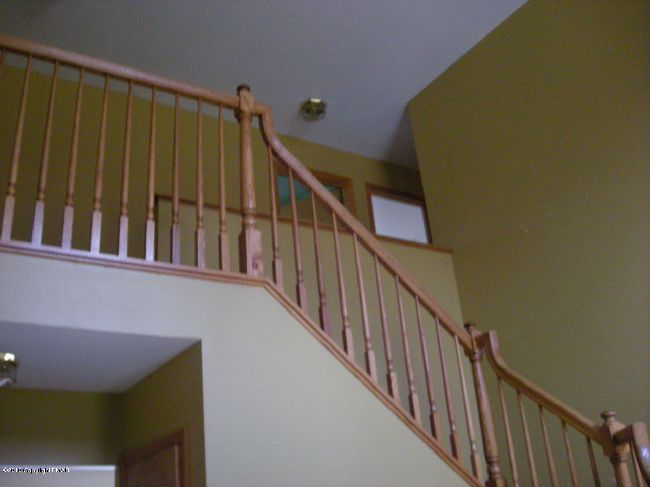 719 Dancing Ridge Road East Stroudsburg, PA 18302 - Photo 7 of 12 a view of staircase with railing and a window