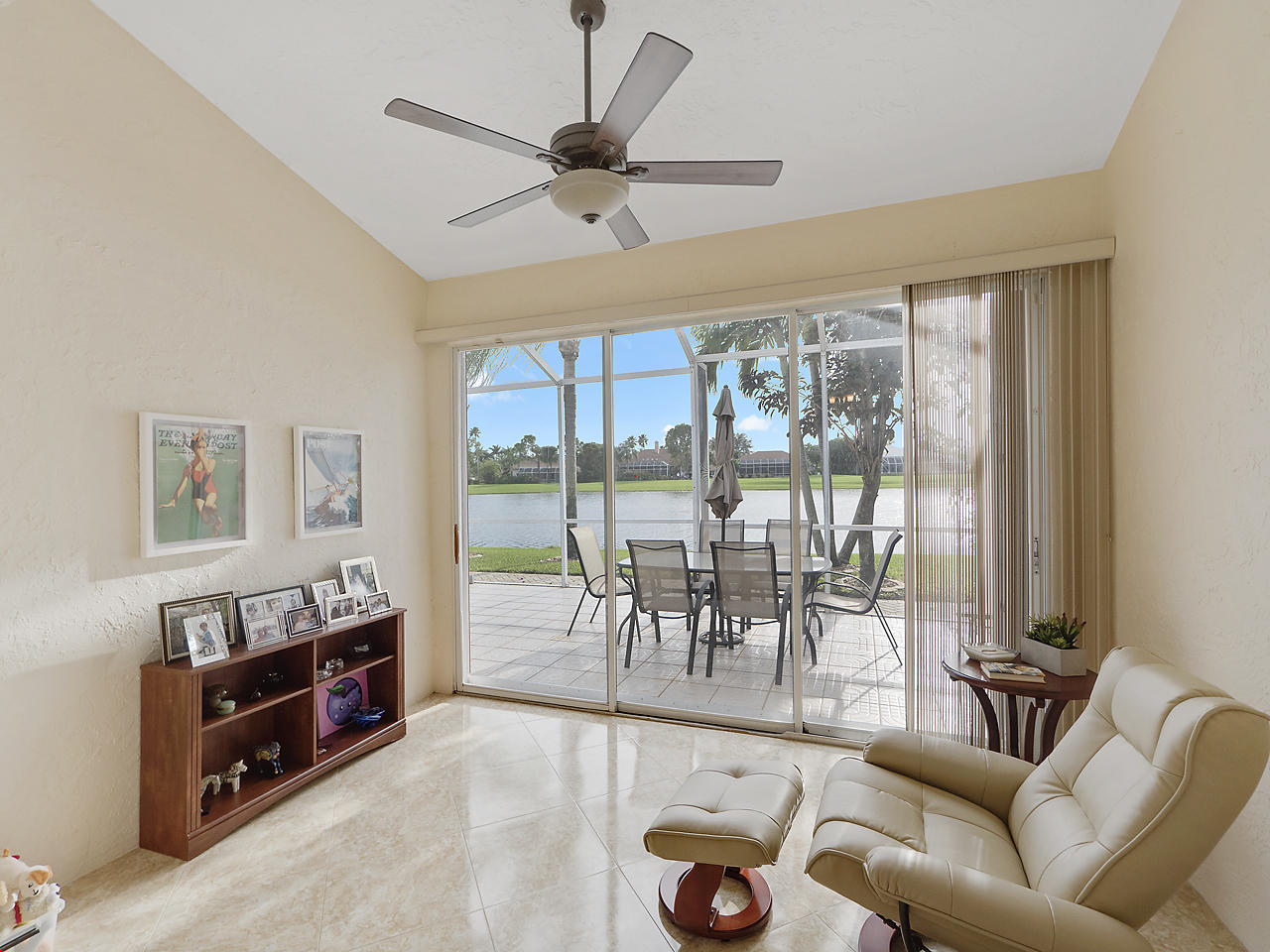 8354 Horseshoe Bay Road Boynton Beach, FL 33472 - Photo 12 of 13 a living room with furniture and a large window