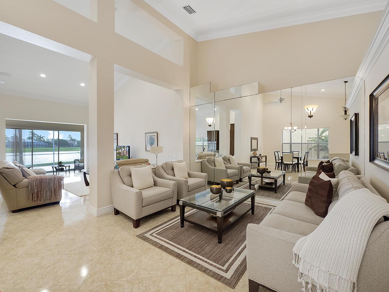 8354 Horseshoe Bay Road Boynton Beach, FL 33472 - Photo 3 of 13 a living room with furniture or couch and a large window