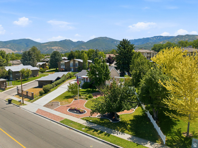 1925 South Main Street Bountiful, UT 84010 - Photo 46 of 48 Expansive landscaping featuring mature trees and a manicured lawn