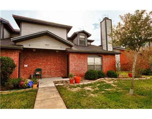 a front view of a house with porch