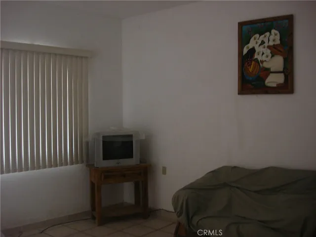 a black and white photo of a floor to ceiling window