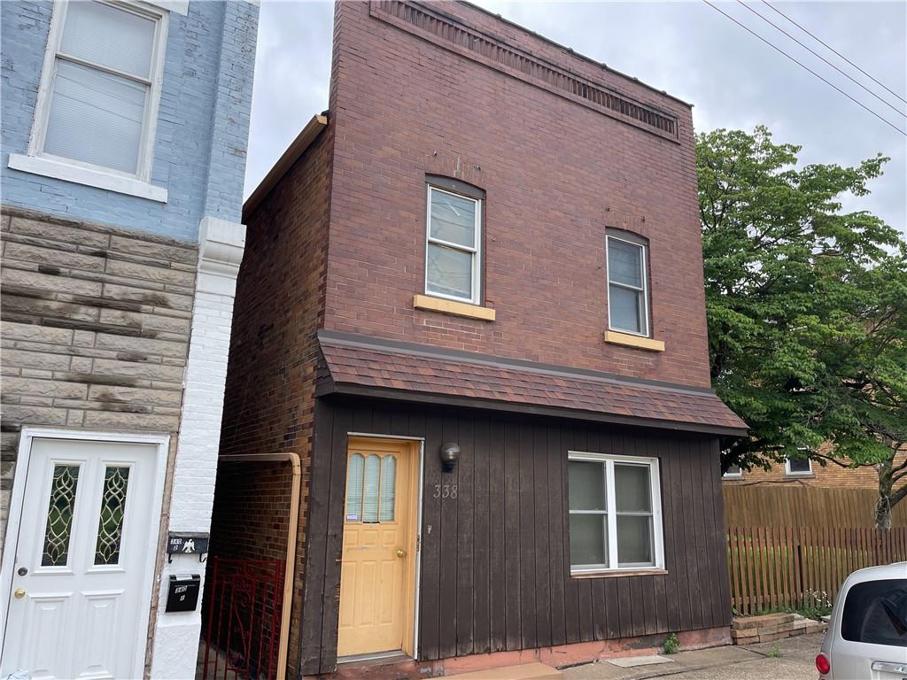 338 Park Ambridge, PA 15003 - Photo 2 of 12 a front view of a house with parking