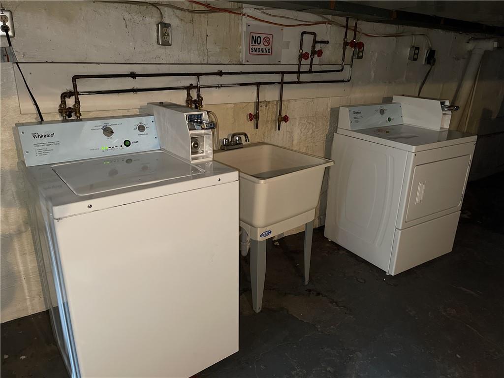 338 Park Ambridge, PA 15003 - Photo 11 of 12 a utility room with dryer and washer