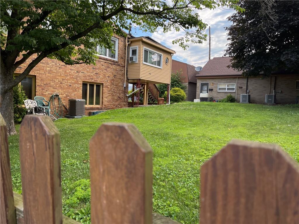 338 Park Ambridge, PA 15003 - Photo 3 of 12 a view of a house with a yard and hanging chair
