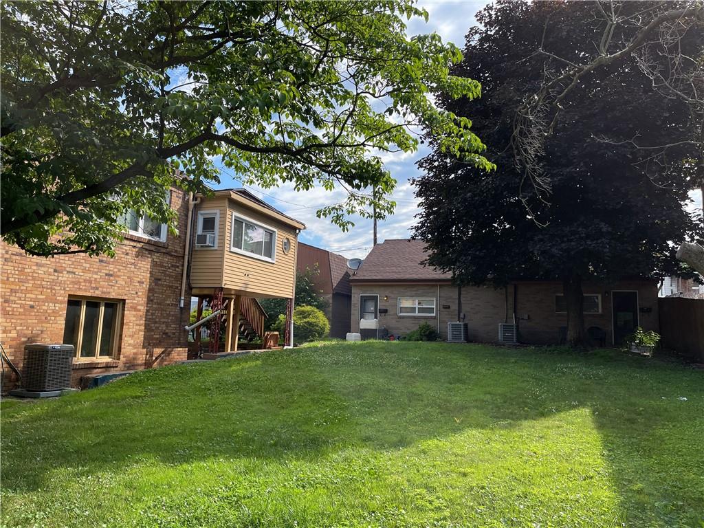 338 Park Ambridge, PA 15003 - Photo 4 of 12 front view of a house with a yard