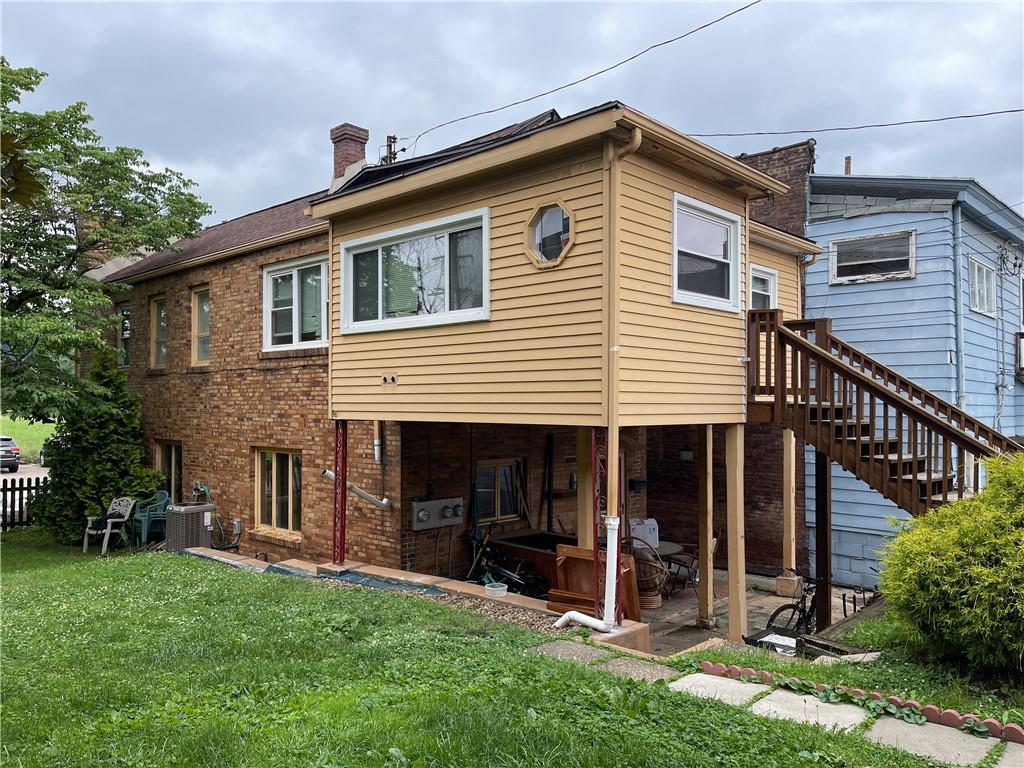 338 Park Ambridge, PA 15003 - Photo 8 of 12 a front view of a house with a yard