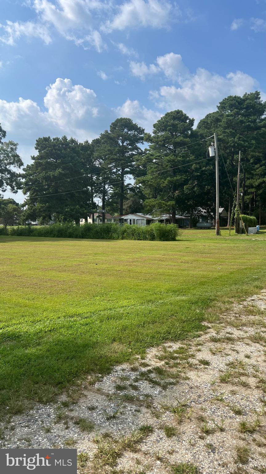 11229 Stewart Neck Road Princess Anne, MD 21853 - Photo 3 of 9 a view of a lake with a houses