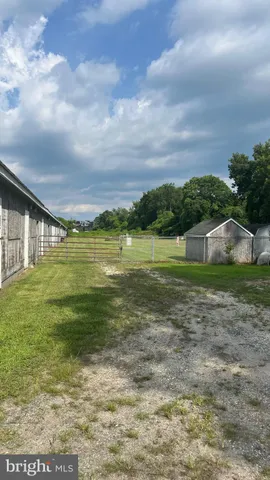 a view of a lake with a big yard