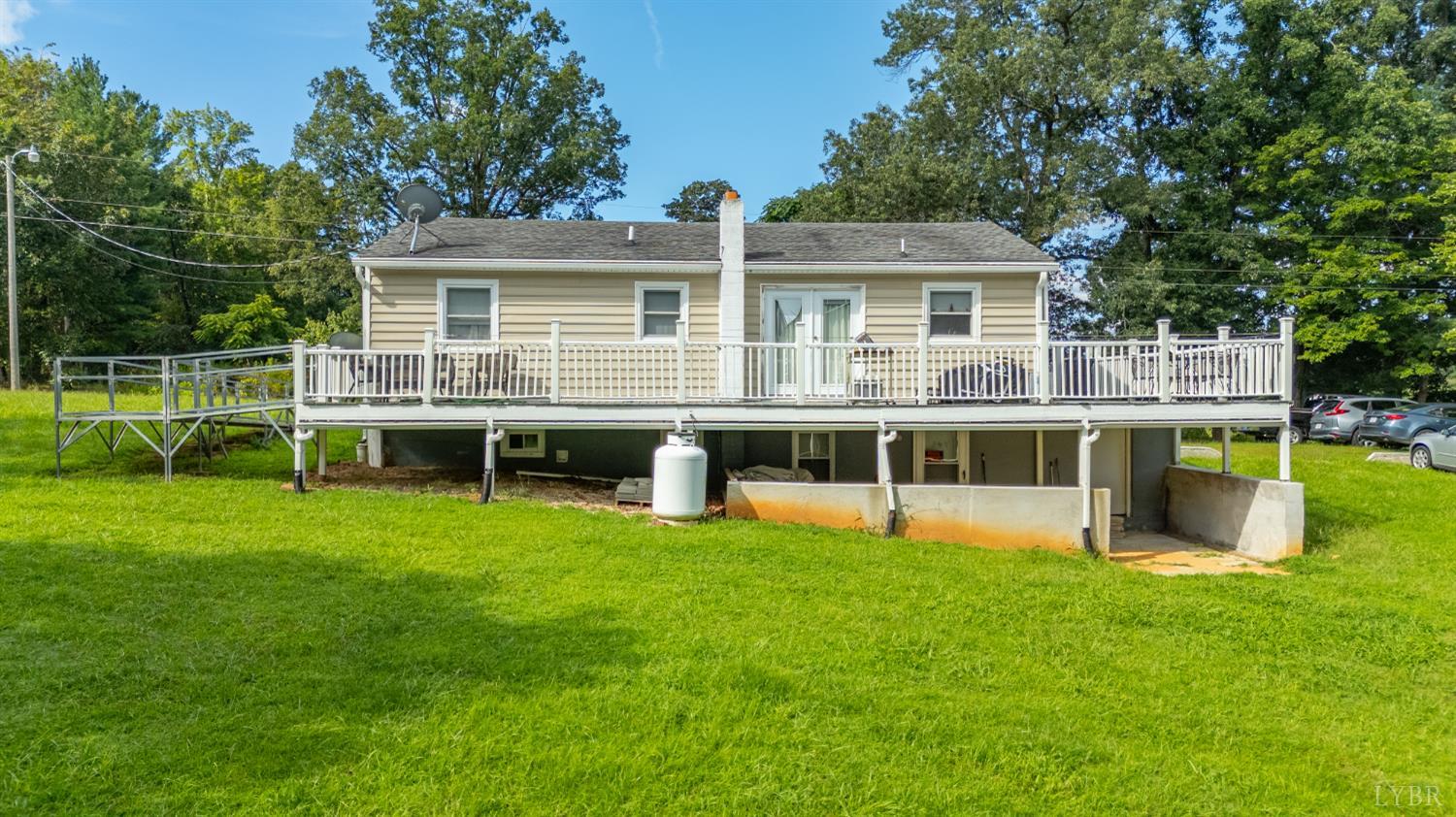 473 Forest Sale Road Amherst, VA 24521 - Photo 24 of 39 a front view of house with a garden and swimming pool