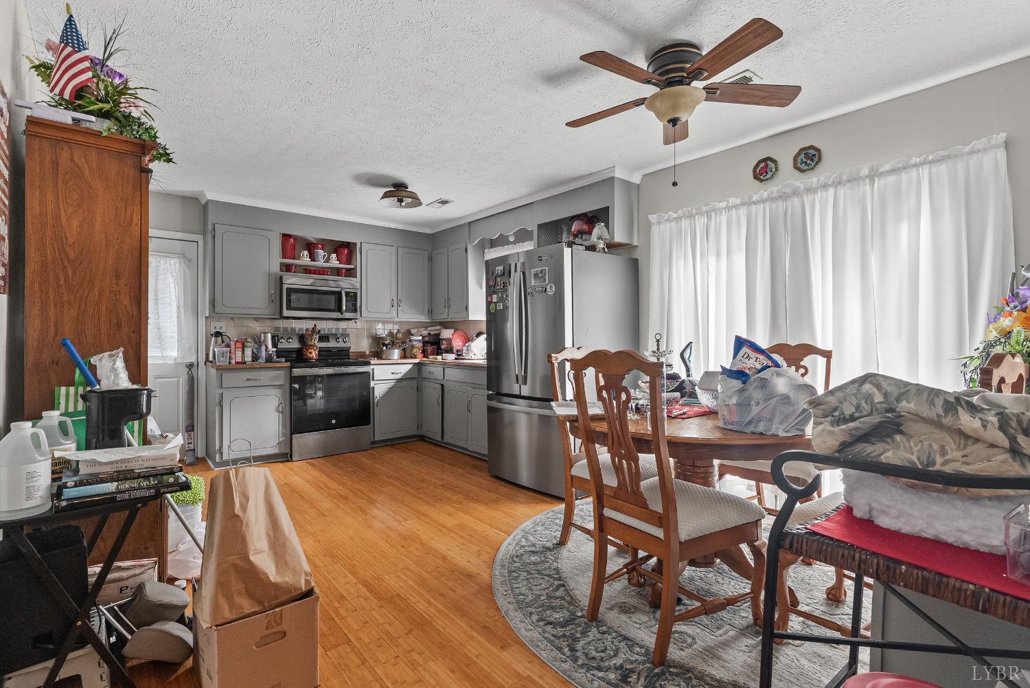 473 Forest Sale Road Amherst, VA 24521 - Photo 5 of 39 a view of a dining room with furniture window and wooden floor
