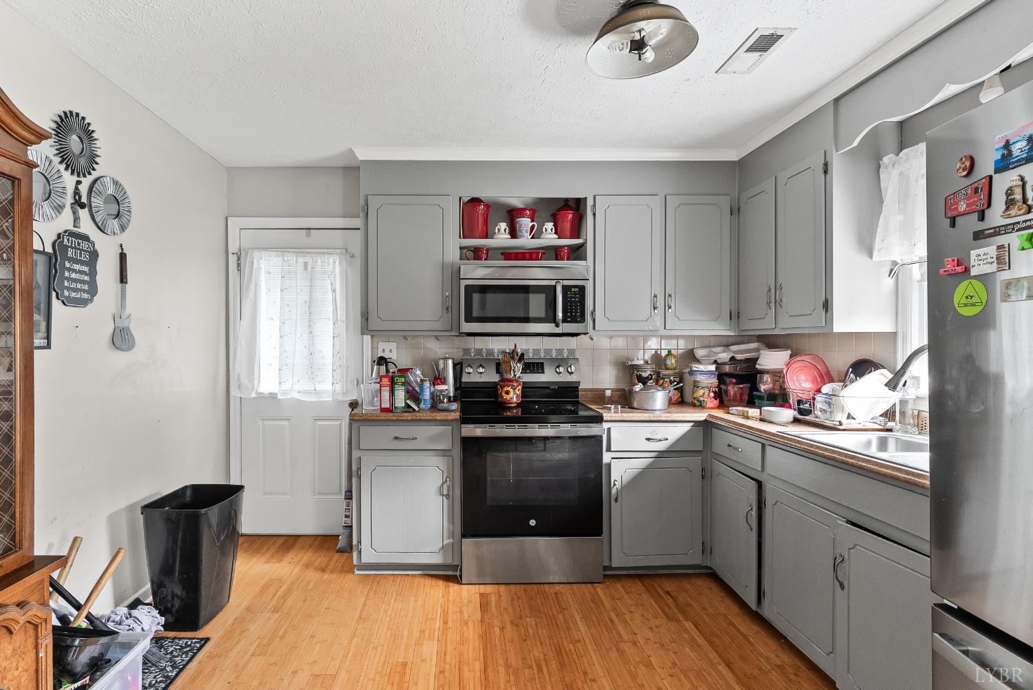 473 Forest Sale Road Amherst, VA 24521 - Photo 6 of 39 a kitchen with stainless steel appliances granite countertop a stove sink and cabinets