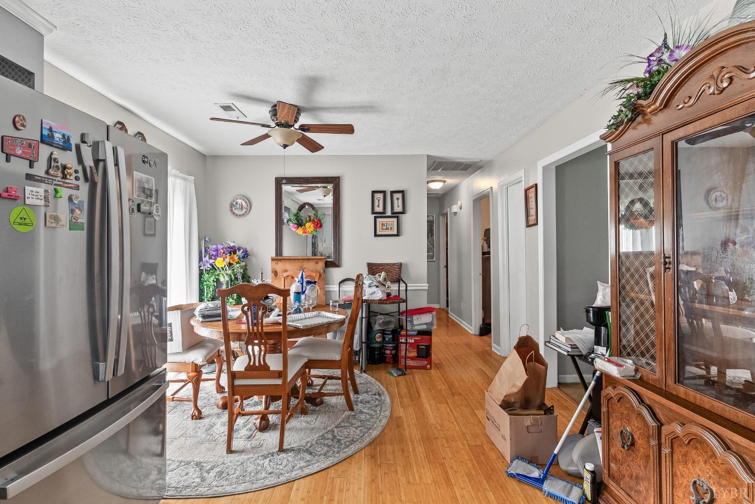 473 Forest Sale Road Amherst, VA 24521 - Photo 8 of 39 a view of a dining room with furniture window and wooden floor