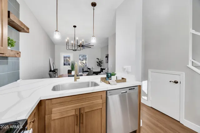 a bathroom with a sink vanity and a mirror